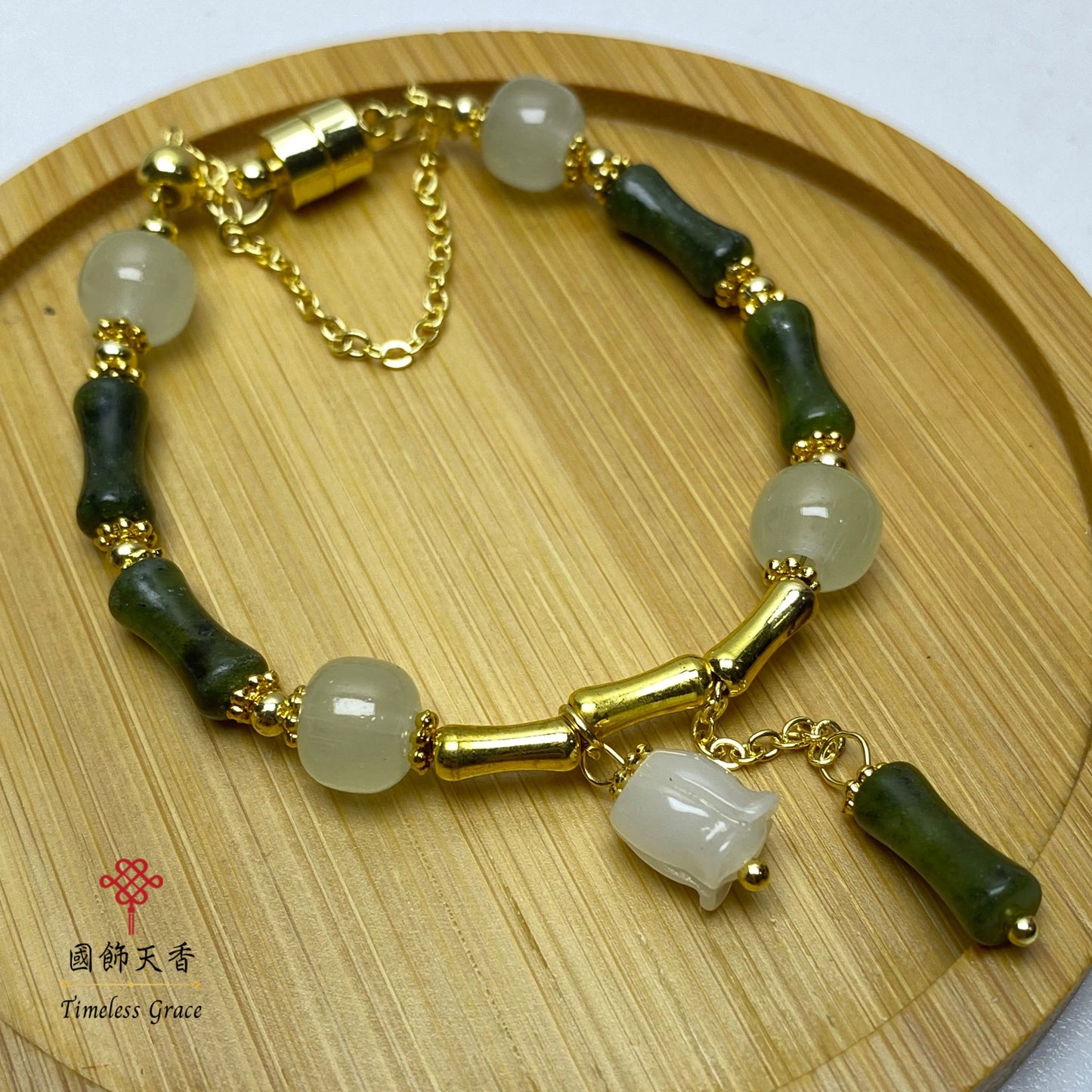 天然橄欖玉鈴蘭花竹節手鏈(磁石扣)
