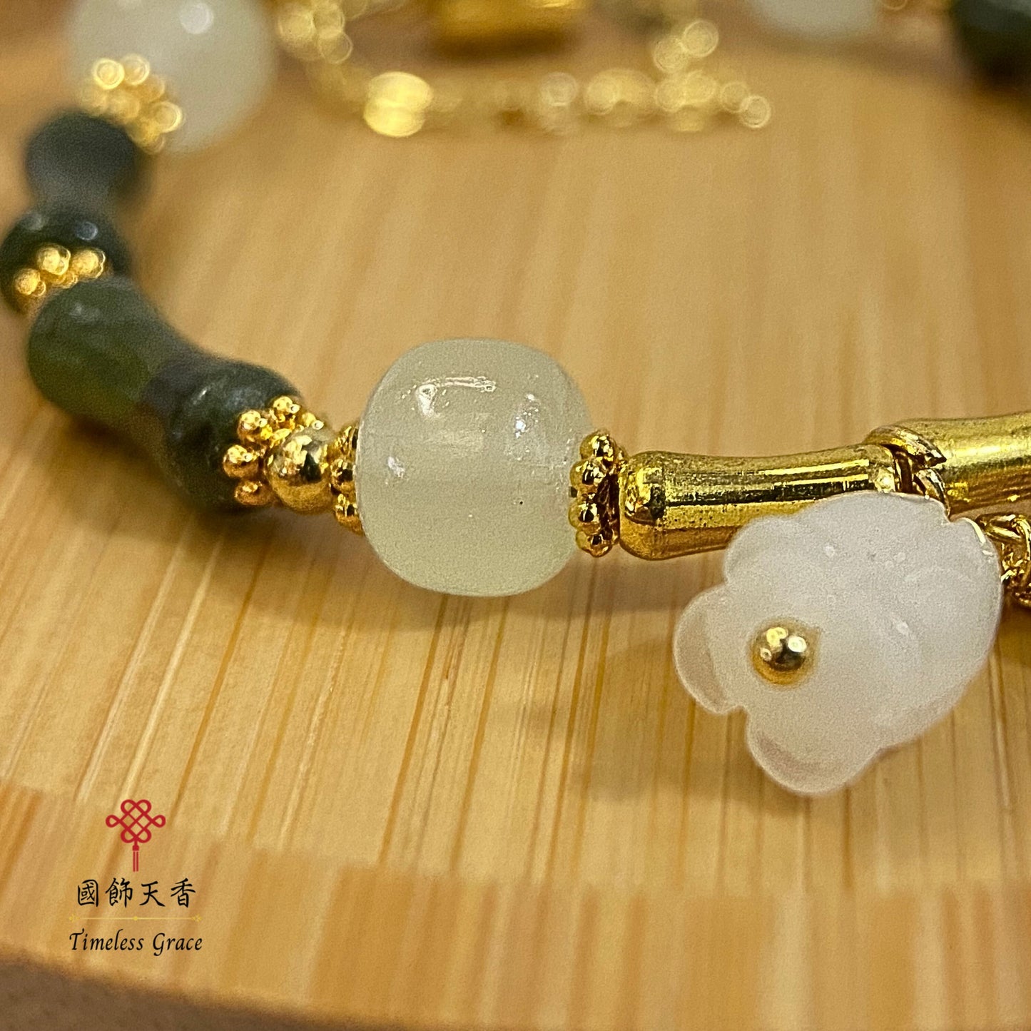 天然橄欖玉鈴蘭花竹節手鏈(磁石扣)